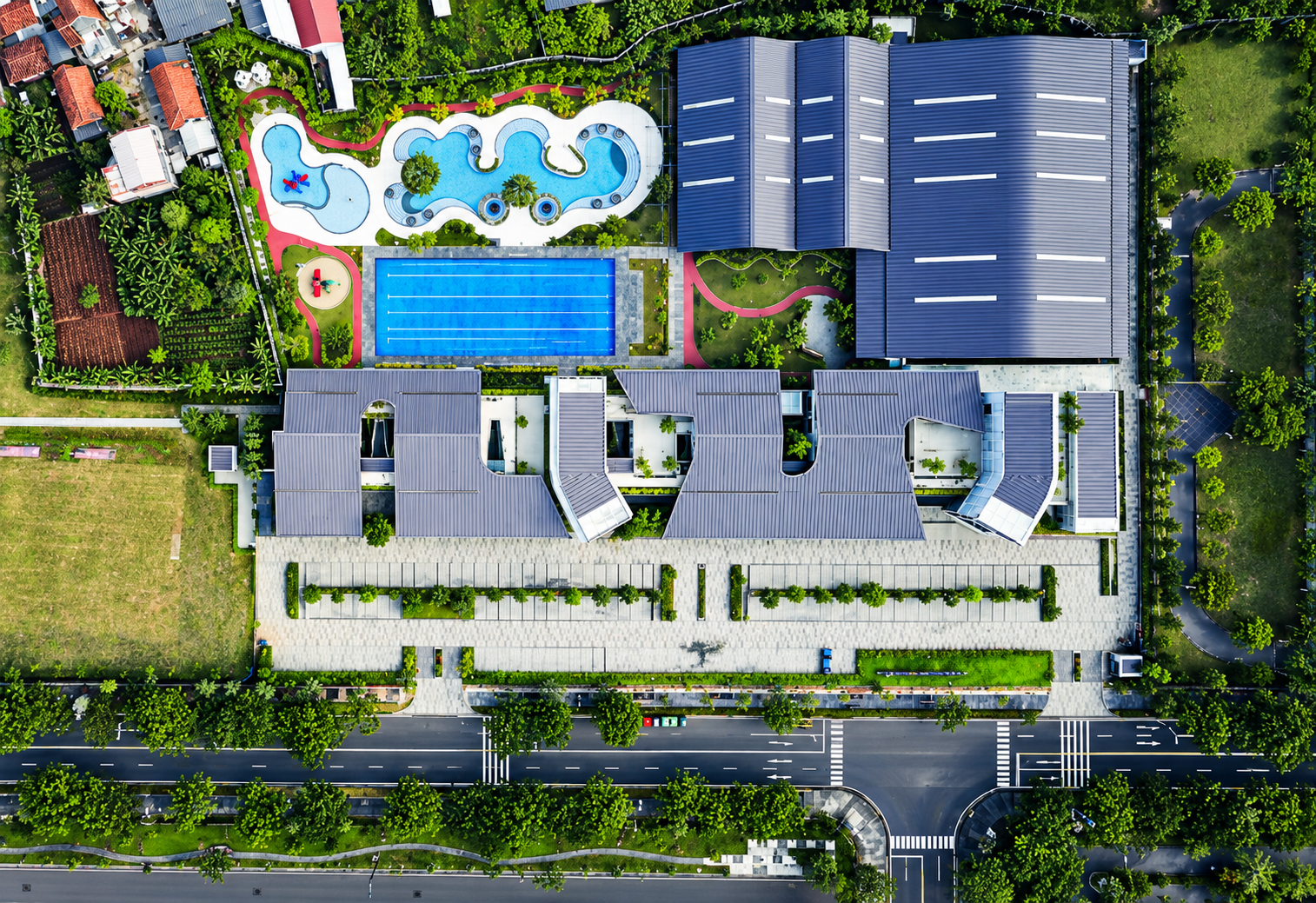 Aerial View of Modern Pool Complex.png