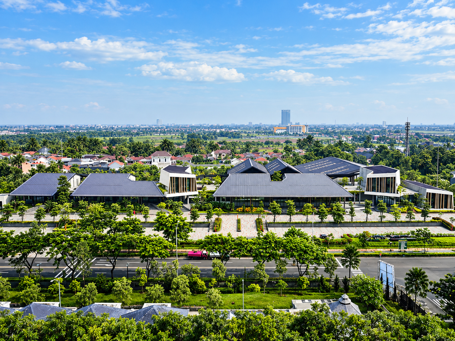 Modern Green Campus Under Blue Skies.png